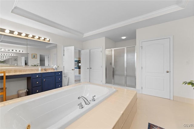 bathroom featuring shower with separate bathtub, vanity, a tray ceiling, and crown molding