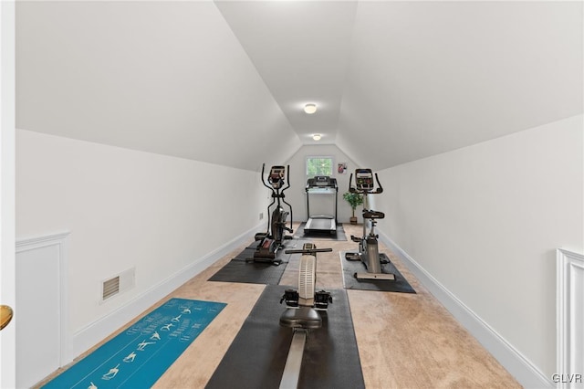 exercise area with lofted ceiling