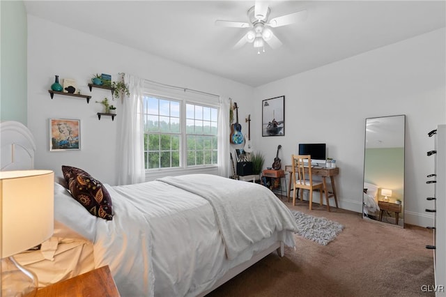 bedroom with ceiling fan and carpet floors