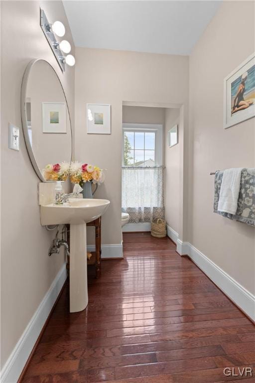 bathroom featuring hardwood / wood-style flooring