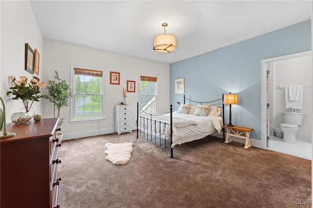 carpeted bedroom with ensuite bathroom