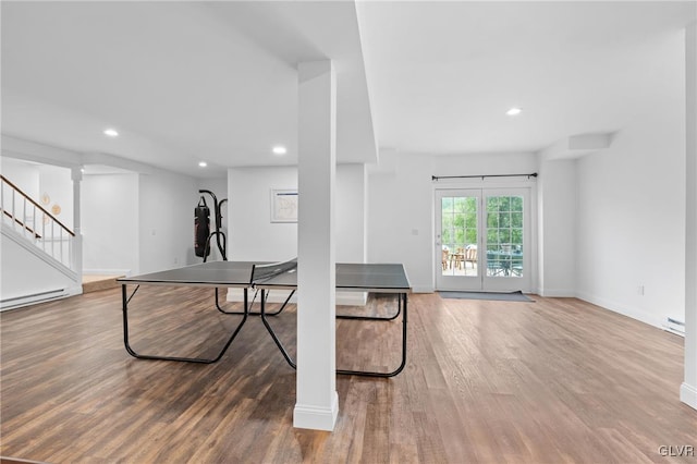 game room with hardwood / wood-style floors