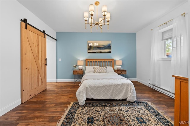 bedroom featuring a barn door, dark hardwood / wood-style flooring, a chandelier, and a baseboard heating unit