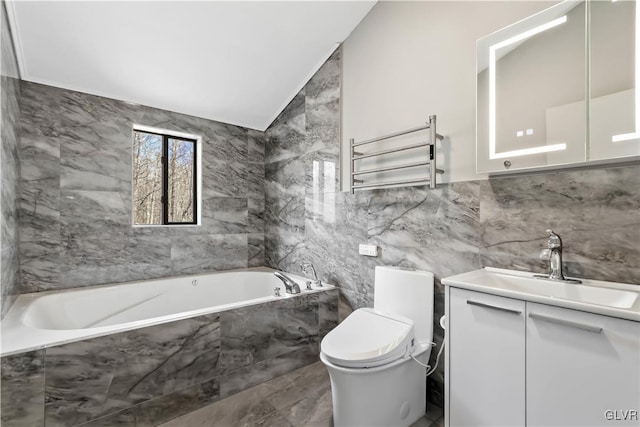 bathroom with radiator, vanity, vaulted ceiling, tile walls, and toilet