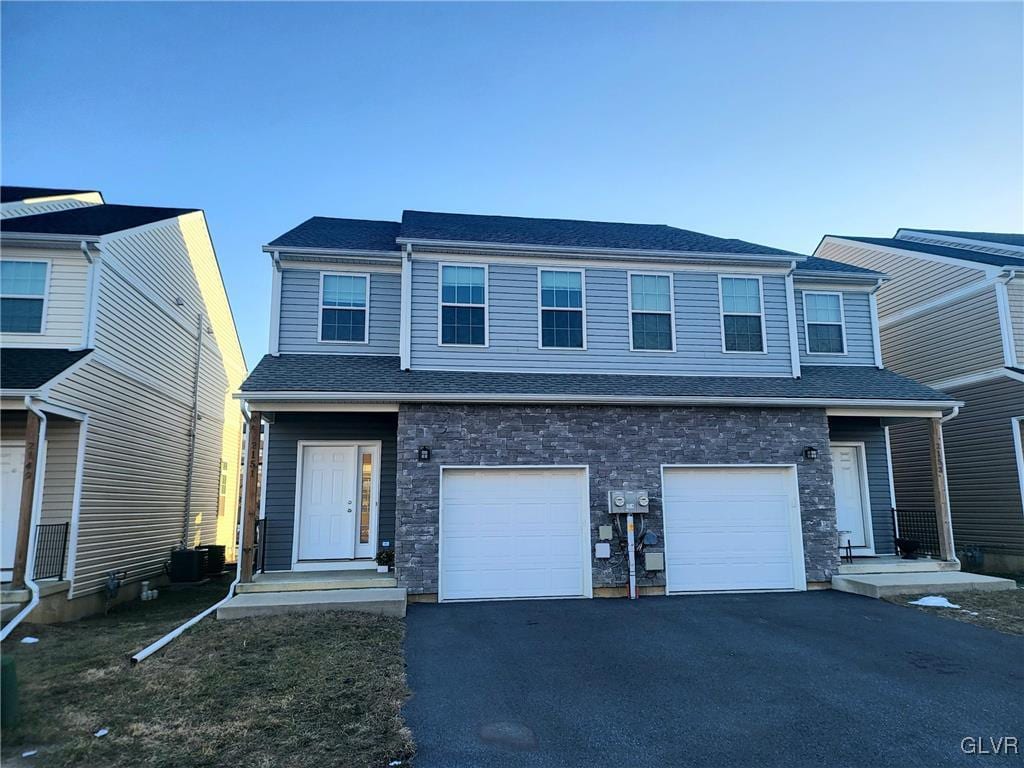 view of front of home with a garage