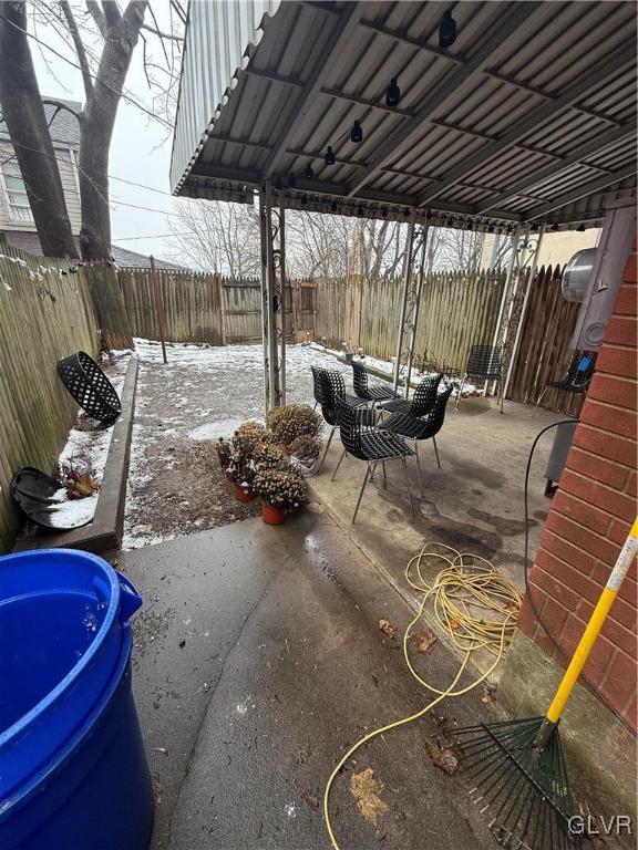 view of snow covered patio