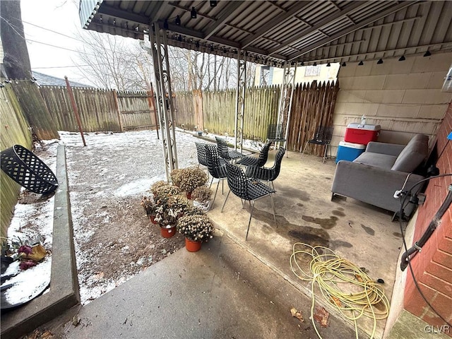 view of snow covered patio