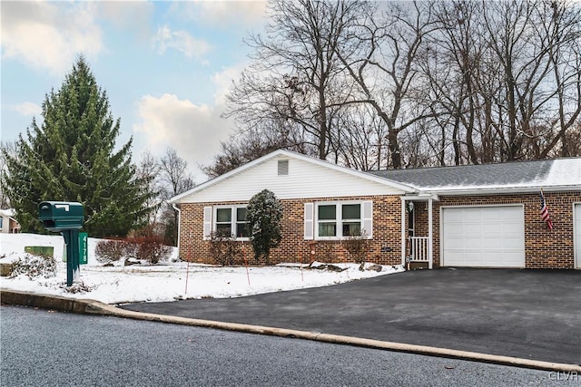 single story home with a garage