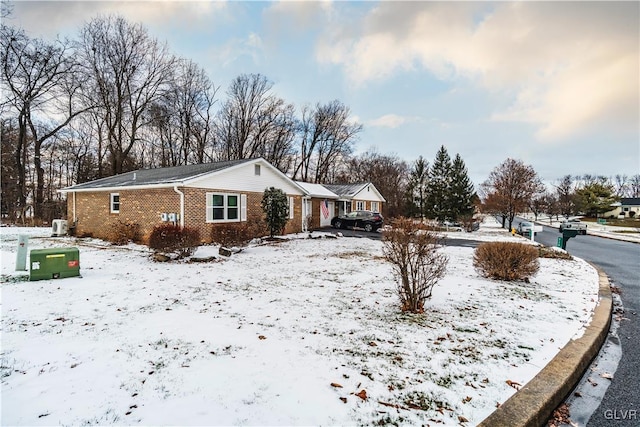 view of snow covered property