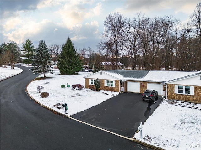 ranch-style home with a garage