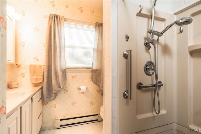 bathroom featuring vanity, a shower, tile patterned floors, toilet, and a baseboard radiator