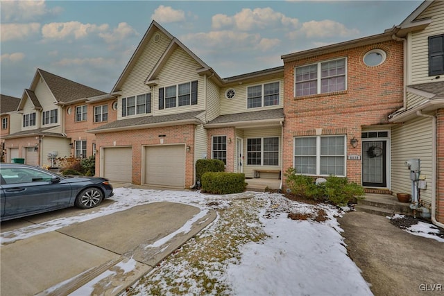 multi unit property featuring a garage