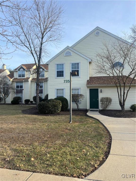 view of front property with a front lawn