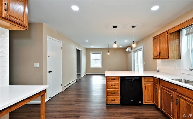 kitchen featuring baseboard heating, dishwasher, decorative light fixtures, decorative backsplash, and kitchen peninsula