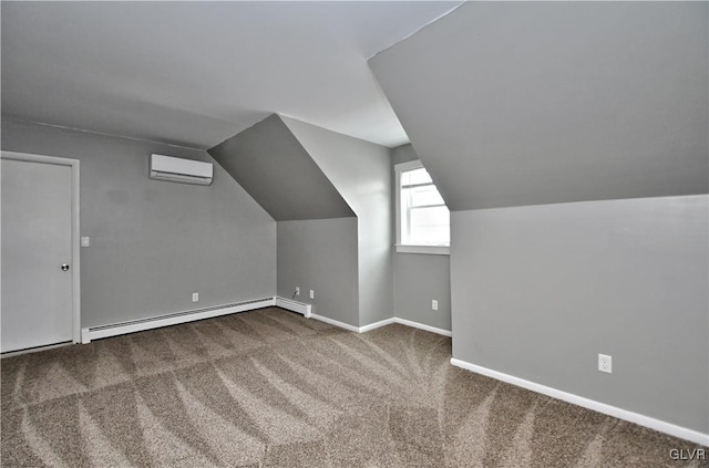 additional living space with carpet, a baseboard heating unit, lofted ceiling, and a wall mounted air conditioner