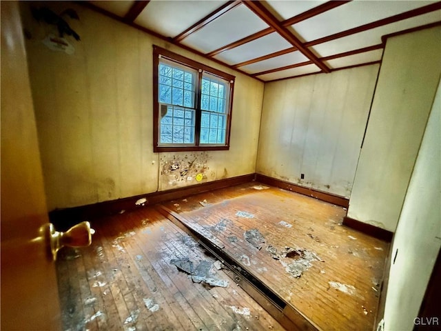 empty room featuring hardwood / wood-style flooring