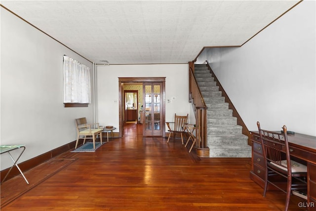 interior space featuring french doors and dark hardwood / wood-style floors