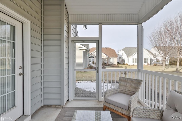 sunroom with plenty of natural light