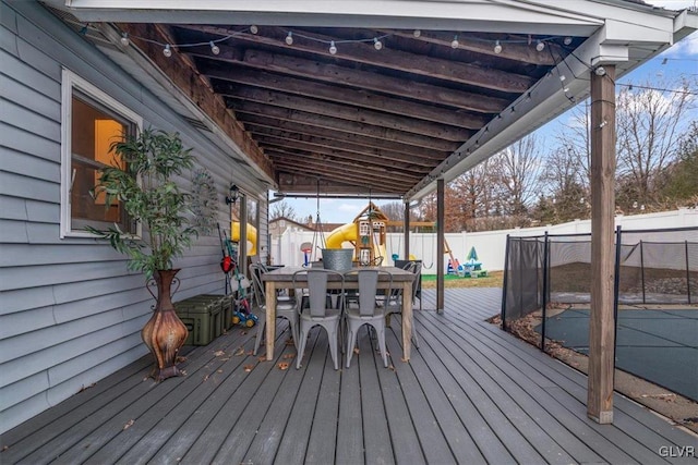 wooden deck with a playground