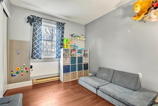 interior space featuring hardwood / wood-style flooring and a baseboard radiator