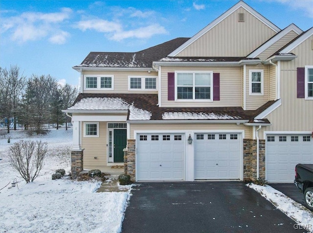 craftsman-style home with a garage