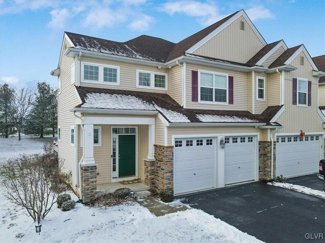 craftsman-style home featuring a garage