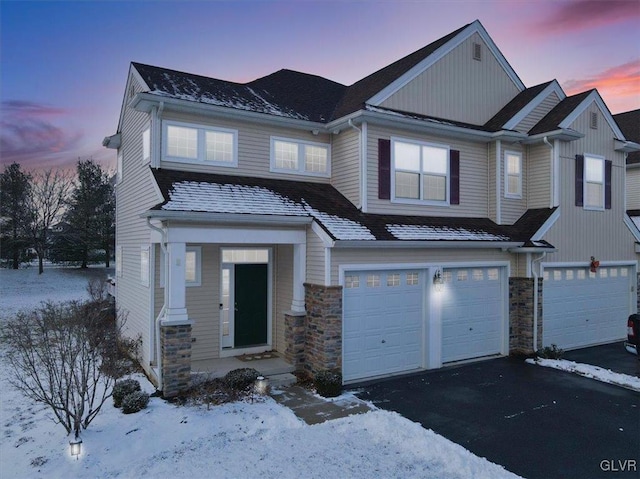 craftsman house with a garage