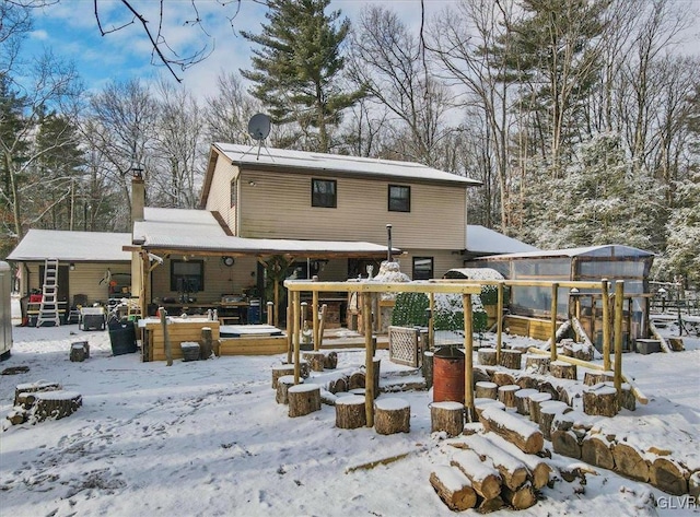 view of snow covered property