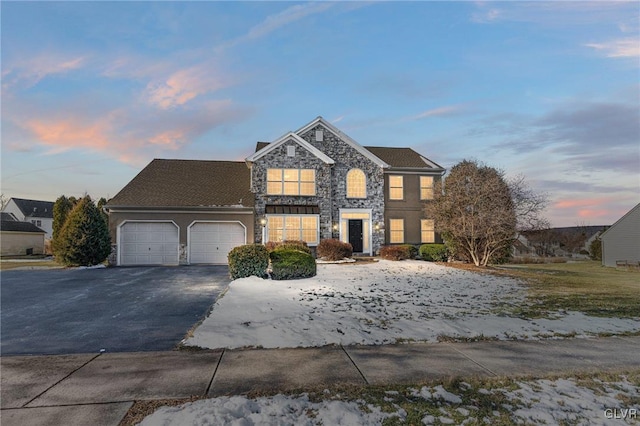 front of property featuring a garage