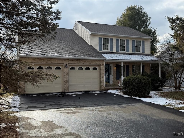 front facade with a garage