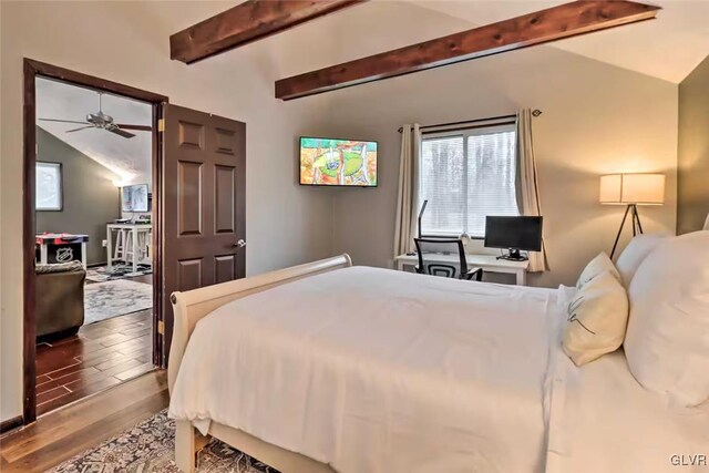 bedroom with hardwood / wood-style floors and lofted ceiling with beams