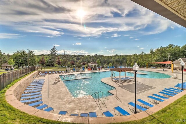 view of pool with a patio and a gazebo