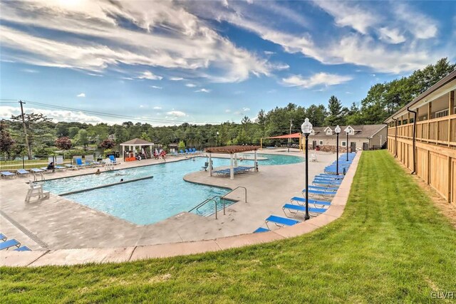 view of pool with a gazebo, a patio, a lawn, and a pergola