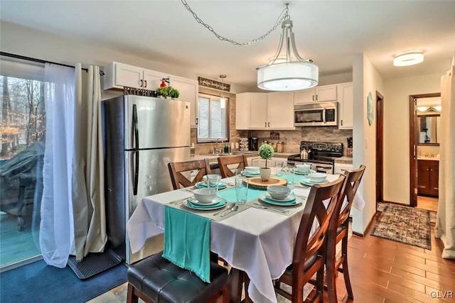 dining space with sink