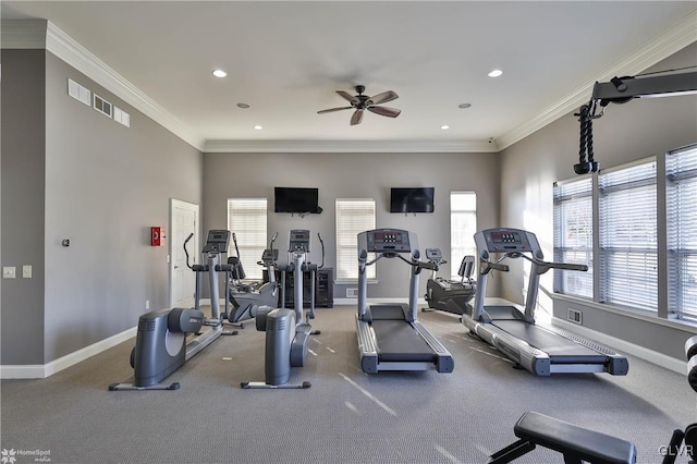 gym featuring ceiling fan and crown molding