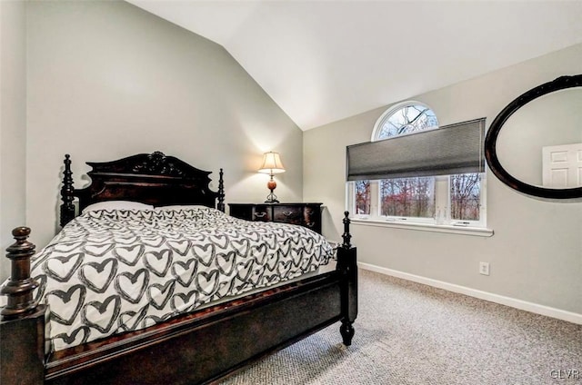 bedroom featuring carpet floors and lofted ceiling