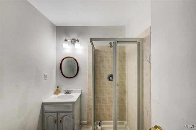 bathroom with vanity and walk in shower