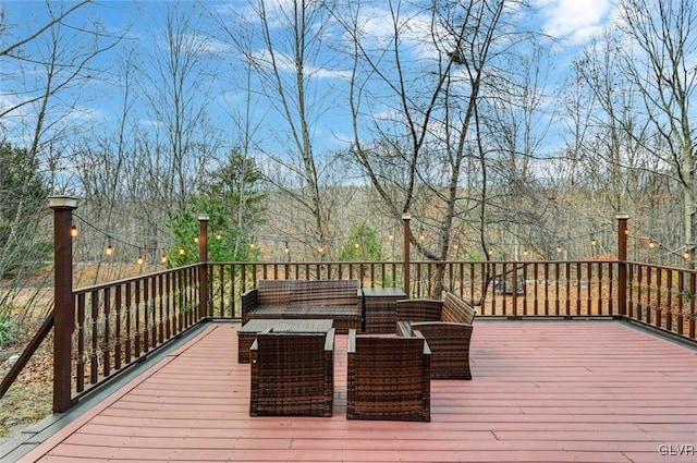 deck with an outdoor living space