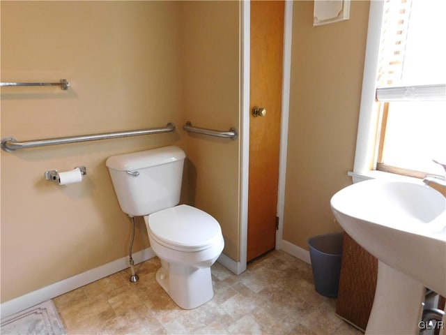 bathroom with sink and toilet