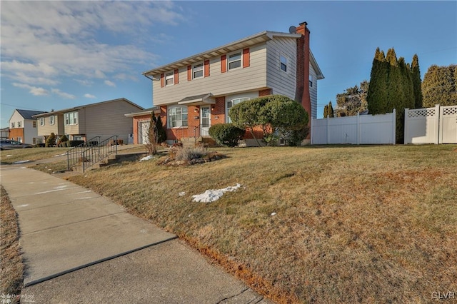 view of front of home with a front yard