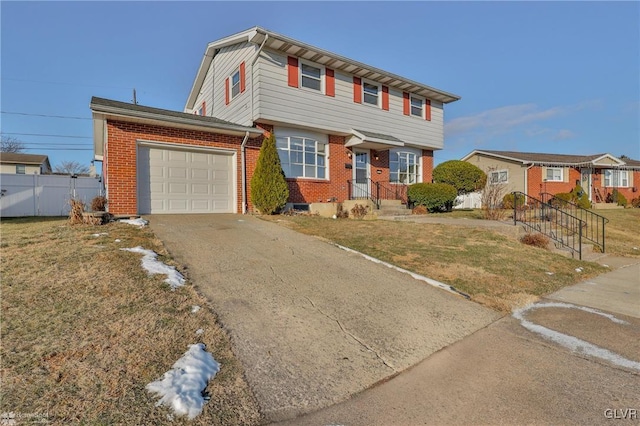 view of front facade featuring a front yard and a garage