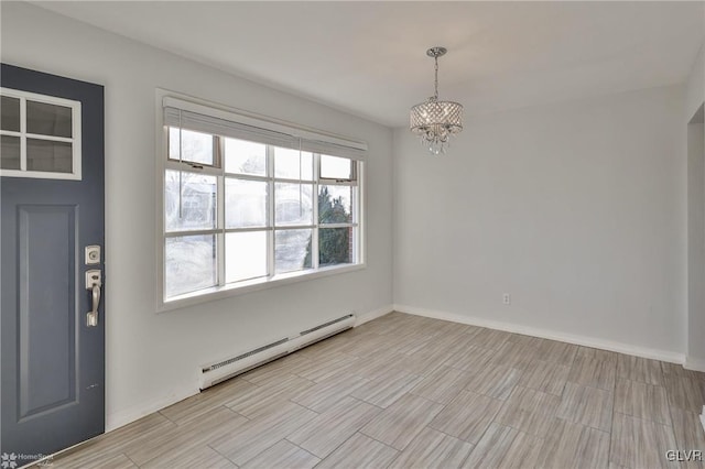 entryway featuring baseboard heating and a notable chandelier