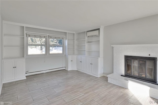 unfurnished living room featuring a fireplace, baseboard heating, built in shelves, and a wall mounted AC