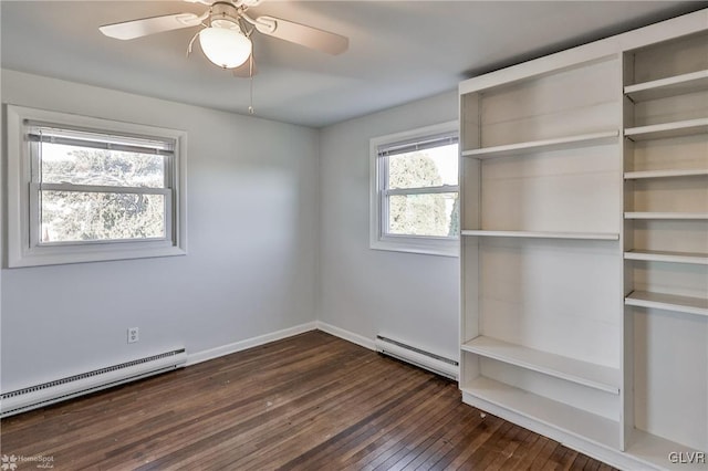 unfurnished bedroom with a baseboard radiator, ceiling fan, and dark hardwood / wood-style floors