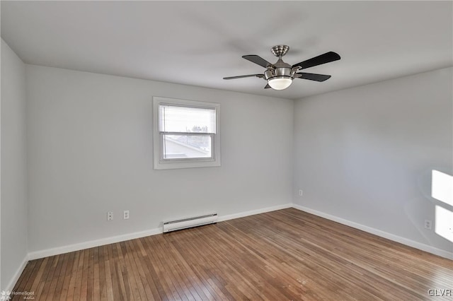 unfurnished room featuring baseboard heating, ceiling fan, and hardwood / wood-style flooring