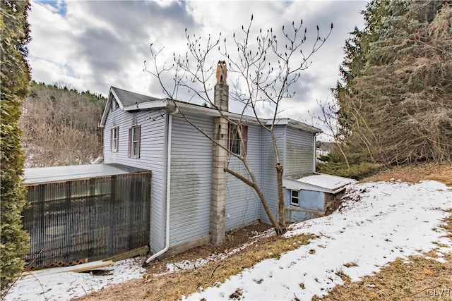 view of snow covered property