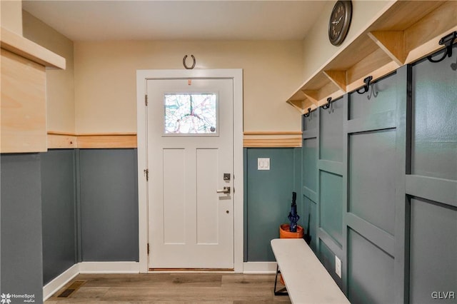 entrance foyer with hardwood / wood-style flooring