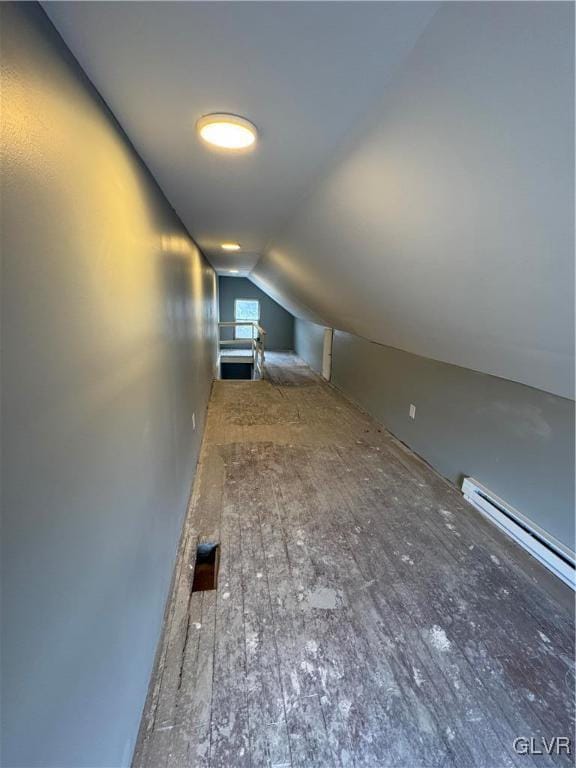 bonus room featuring vaulted ceiling