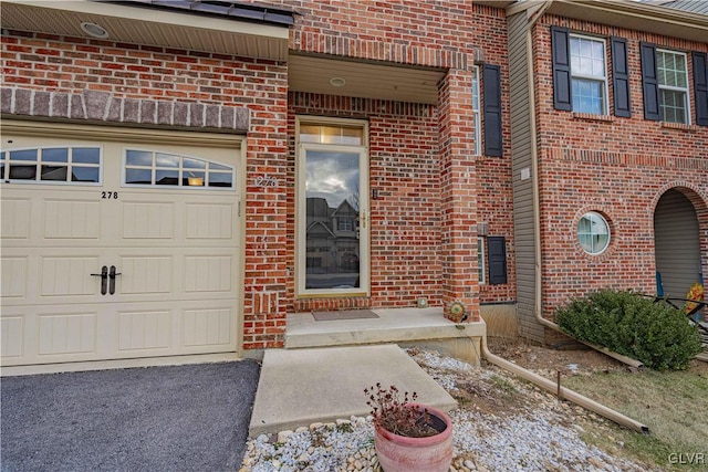 entrance to property with a garage