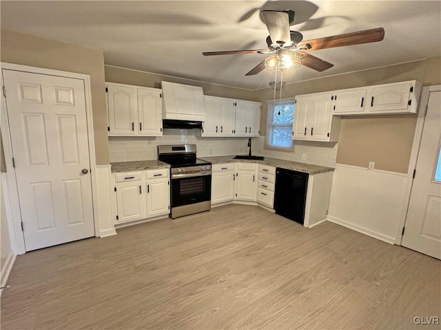 kitchen with light stone countertops, white cabinetry, dishwasher, and stainless steel electric range oven